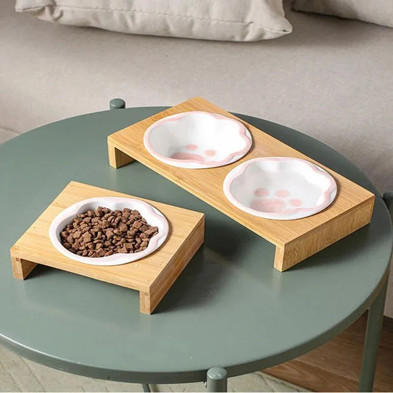 Raised pet bowl with bamboo frame and hand coloured ceramic bowl for cats and small dogs in blue, pink or yellow