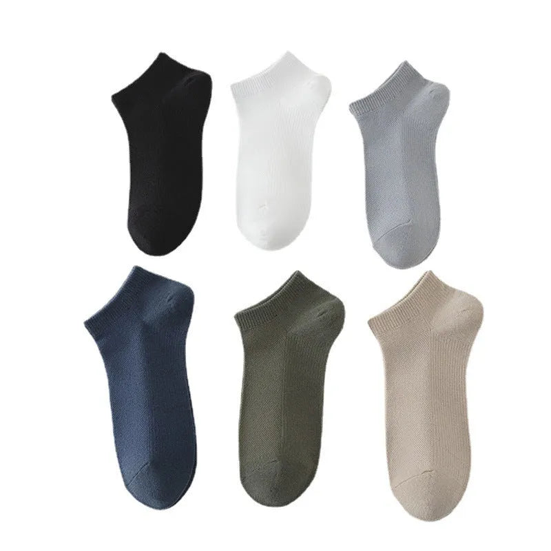 Men's solid colour polyester boat socks in low-cut design showing six colour variations