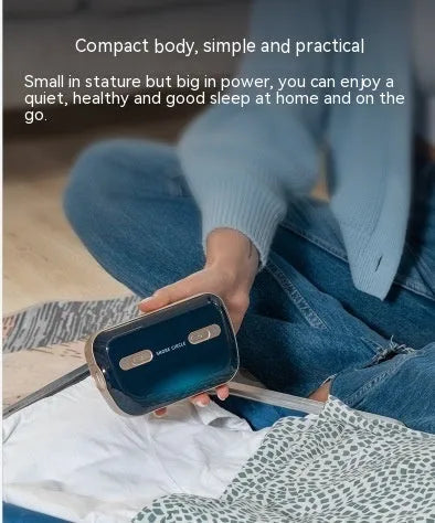 Yunzhongfei dark blue portable anti-snoring ventilator with nose mask and breathing pipeline on a table
