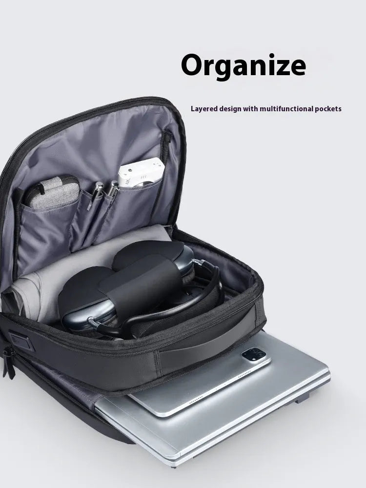 Graphite grey USB business backpack with Oxford cloth exterior and visible sewing thread construction