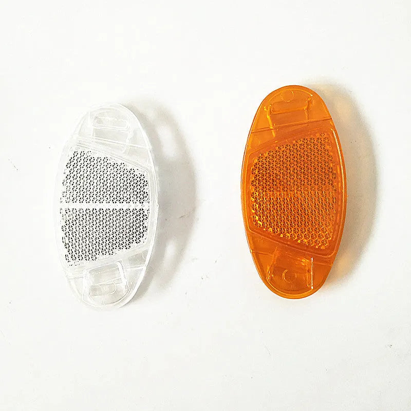 White and yellow plastic bicycle reflector spoke decorations for front and rear wheel safety lighting