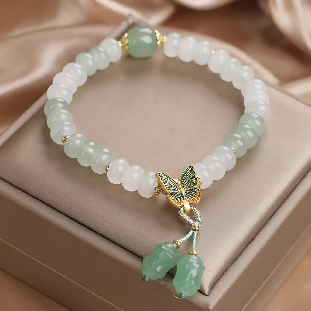 Green women's bracelet with Tian Shan Cui abacus beads and retro butterfly tassel design