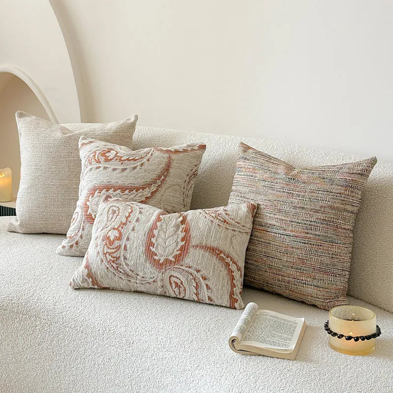 American-style yarn-dyed jacquard sofa cushion with paisley pattern in amber colours