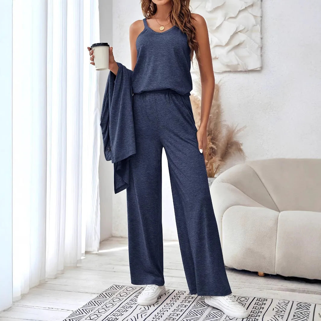 Blue women's three-piece co-ord set with sling top, long cardigan, and trousers on a hanger.