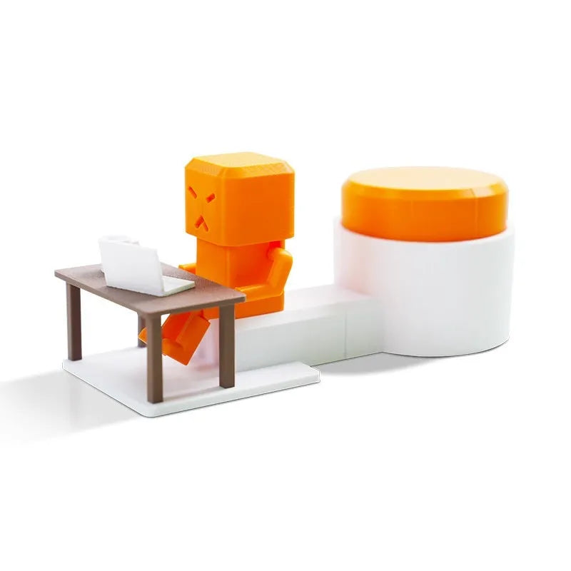 Orange plastic table turning decompression toy on desktop surface