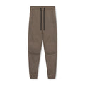 Men's dark grey quick-dry ankle-tie fitness pants shown in a loose fit.