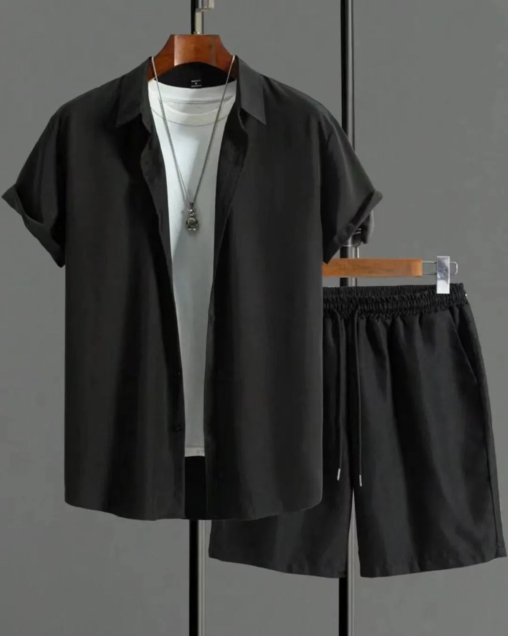 Jacquard fabric short sleeve suit set with matching shorts in a solid colour.