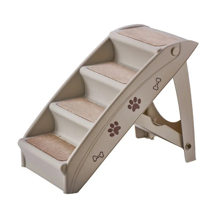 Foldable plastic pet step for small dogs and cats on a carpet next to a sofa.