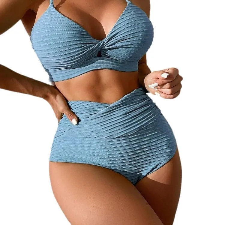 Women's solid colour polyester bikini set shown in navy blue, on a white background.