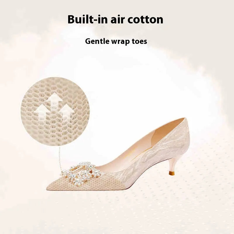 Champagne Gold pointed-toe high heel pumps with rhinestone and sequin decorations on a stiletto heel.