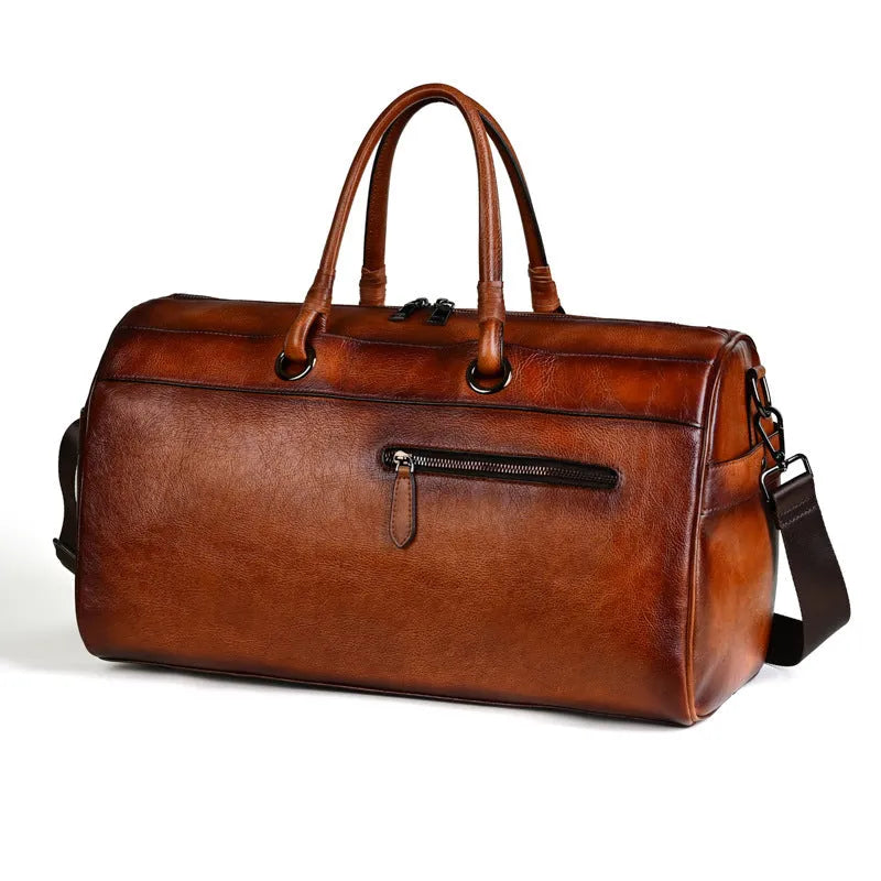 Handmade retro style leather bag in vintage brown colour showing first layer cowhide texture and large capacity design