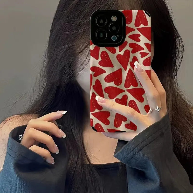 All-inclusive imitation leather phone case with full screen red love heart design for Apple iPhone.