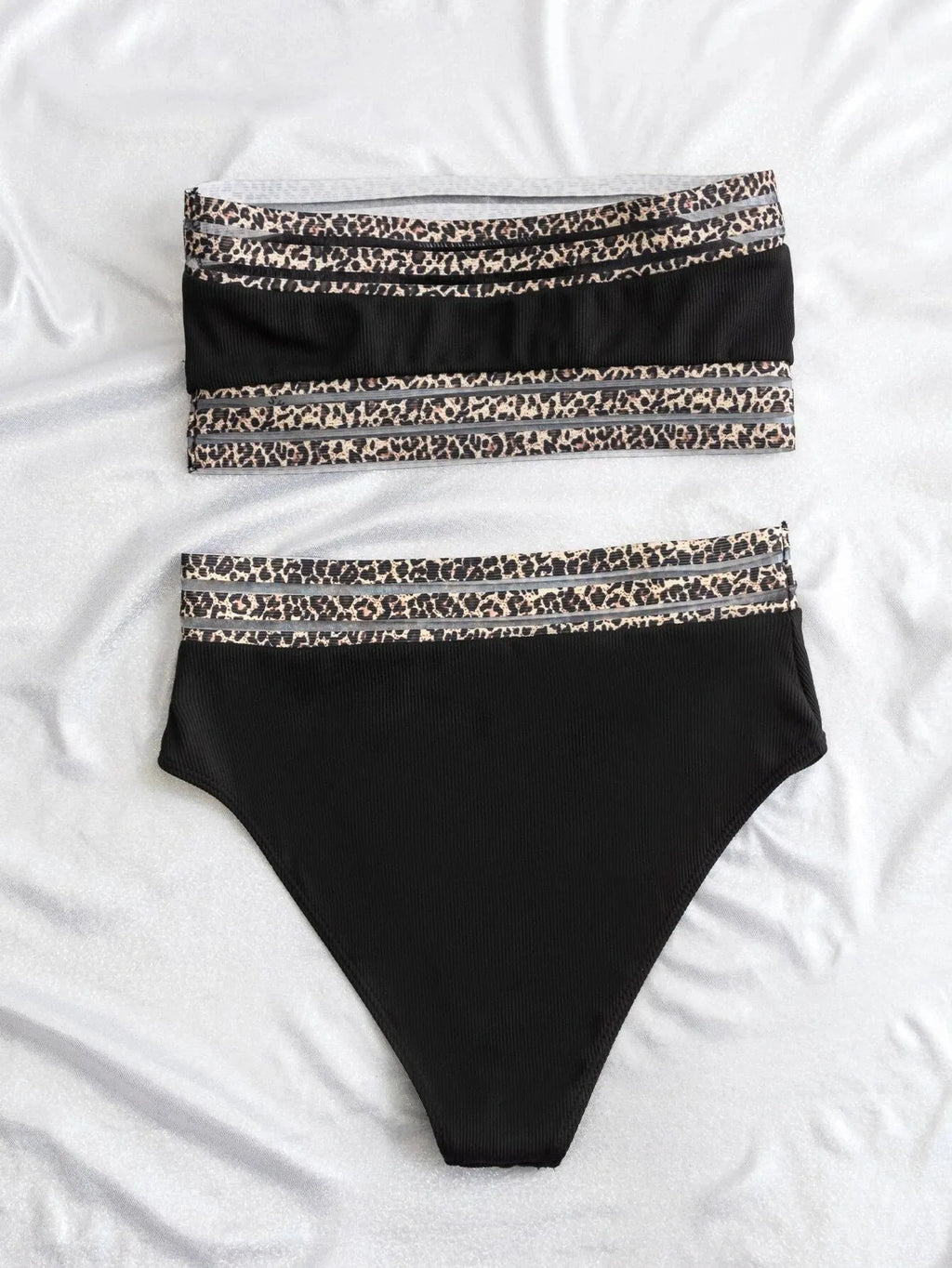 Black strapless bikini top and briefs swimsuit set with leopard pattern splicing.