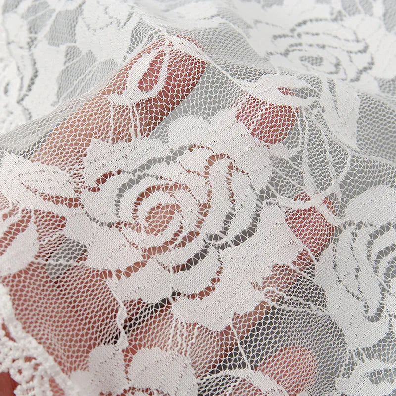 Small round bridal head cover in black or white, 30cm wide, made from polyester fabric.