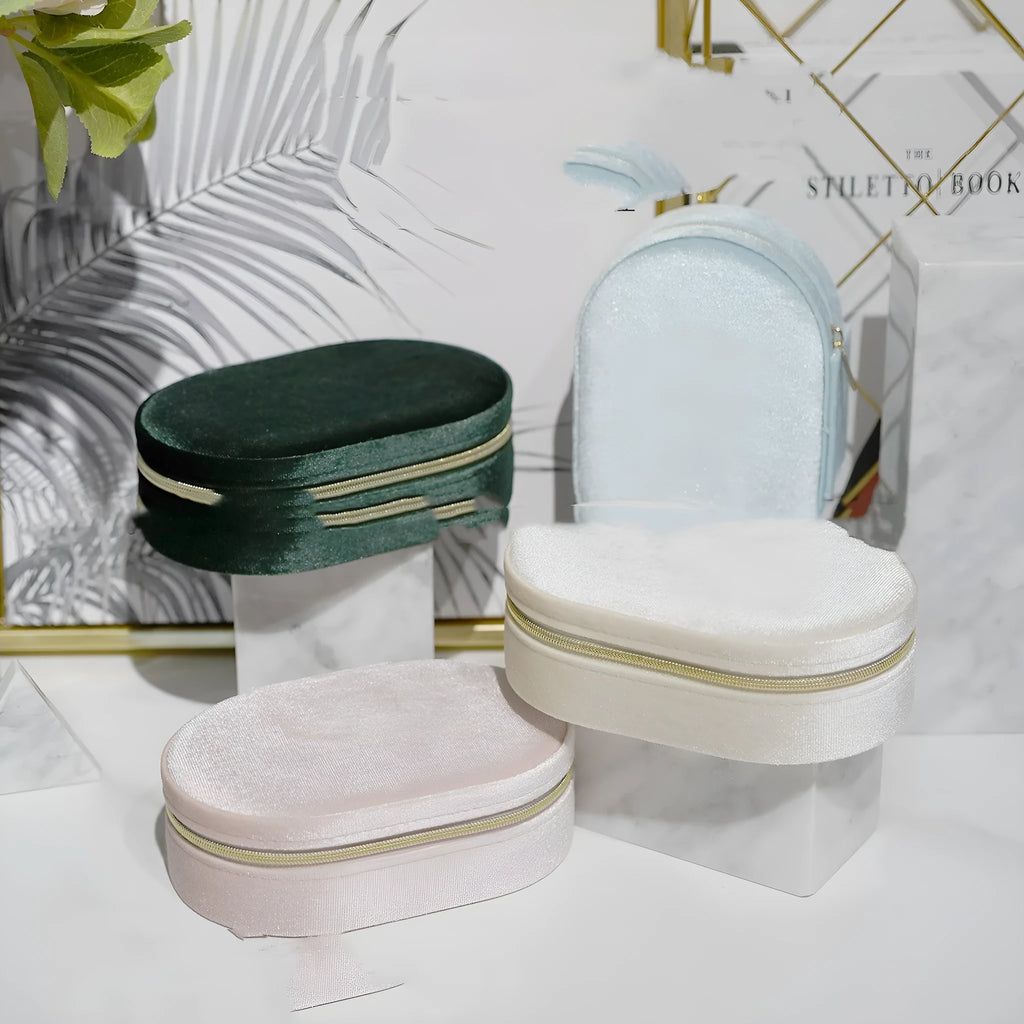 Oval velvet jewellery storage box with flannel interior in Korean style design measuring 15x10x5cm