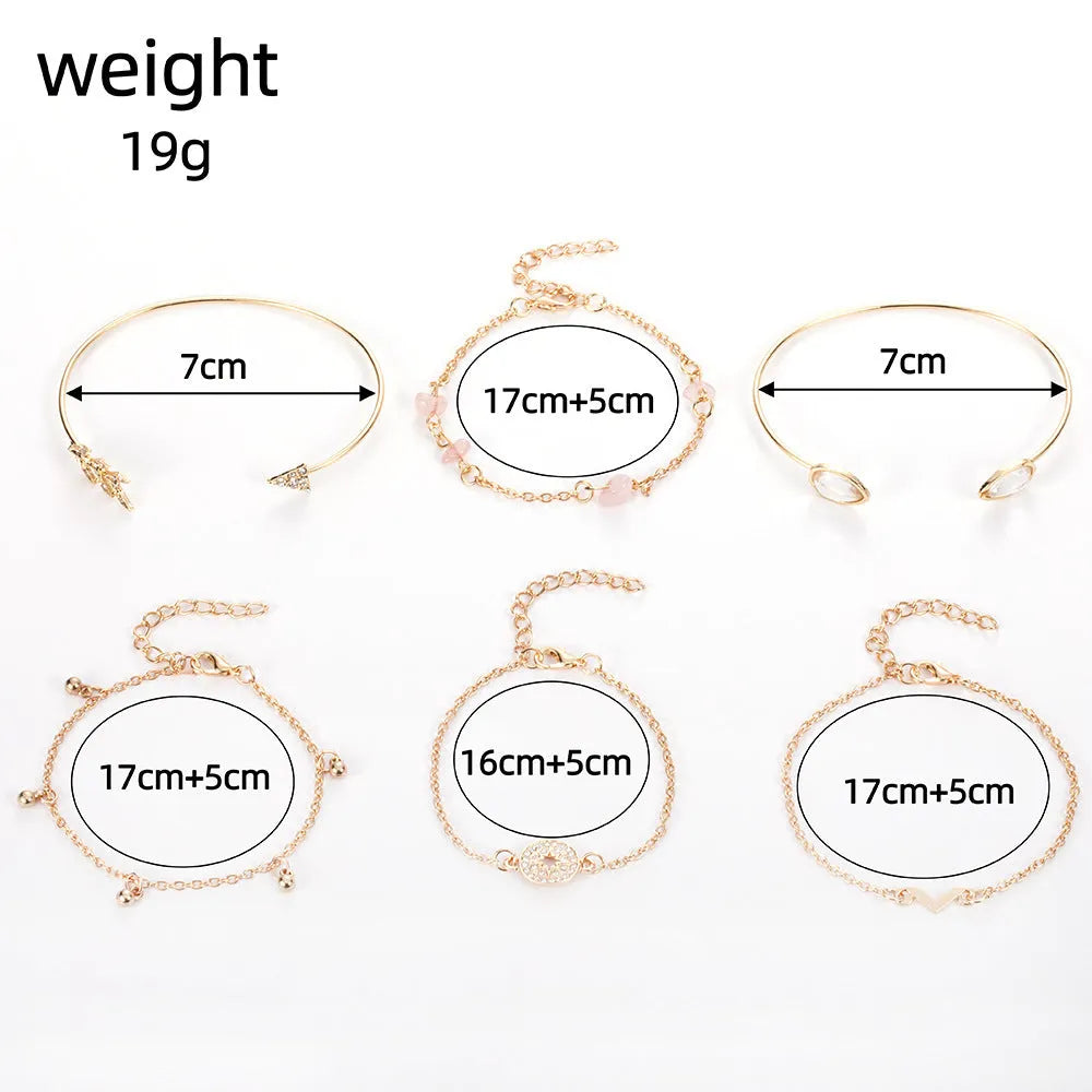 Set of six gold fashion bracelets with water droplet, arrow, V-shape and drill designs.