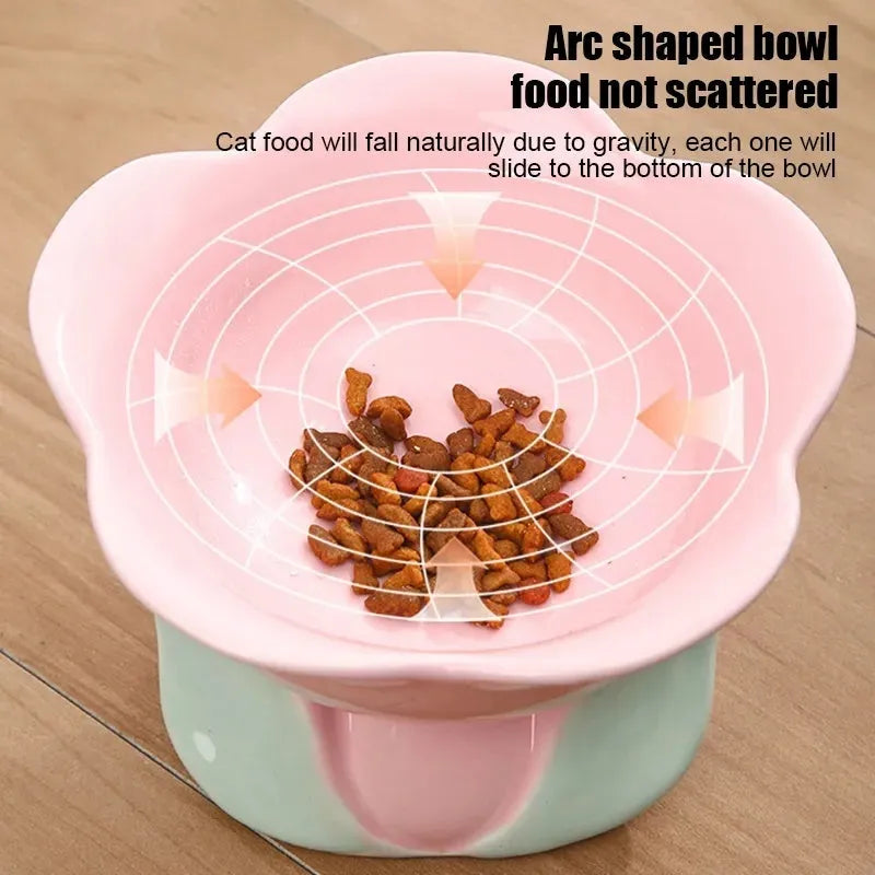 Blue ceramic raised pet bowl with floral pattern and non-slip base for cats or small dogs