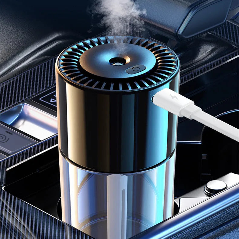 Glass AI intelligent spray perfume humidifier on a desk with USB cable.