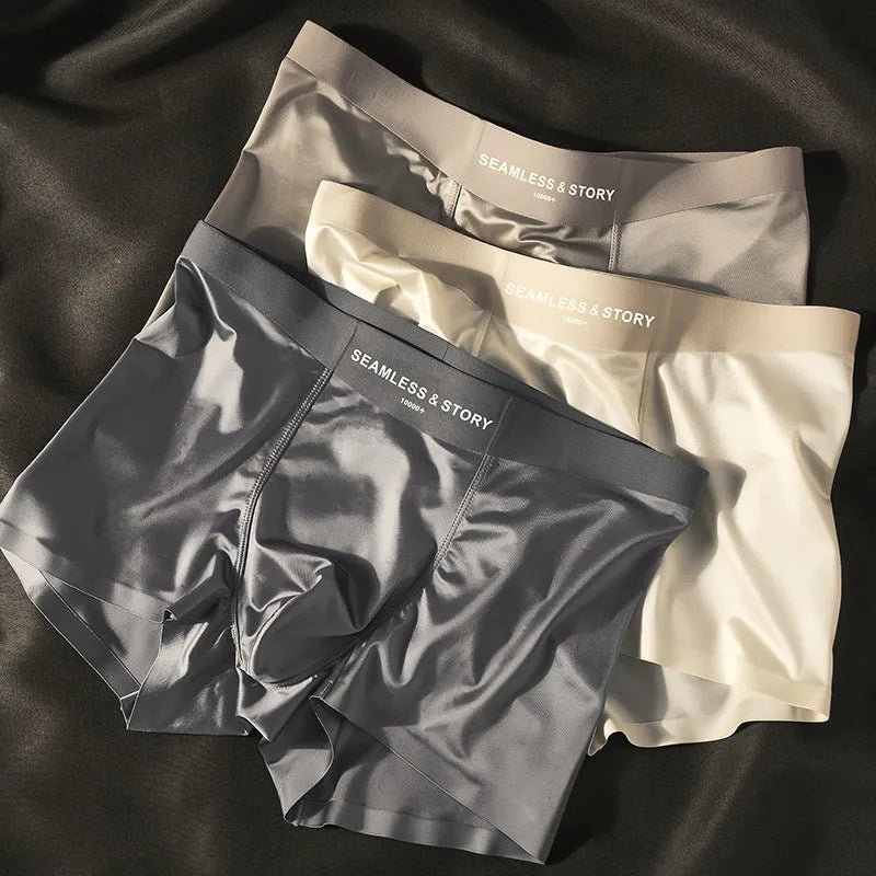 Men's ice silk satin underwear in mid-waist style showing coffee, grey, white, and blue colours.