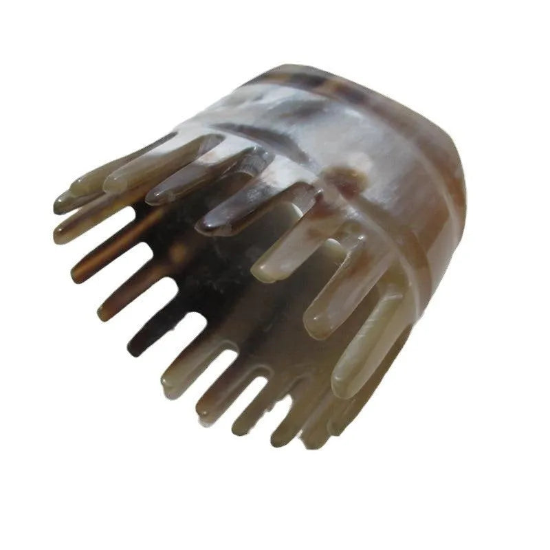 White buffalo horn female head meridian massage comb with pointed tips and wide teeth sections