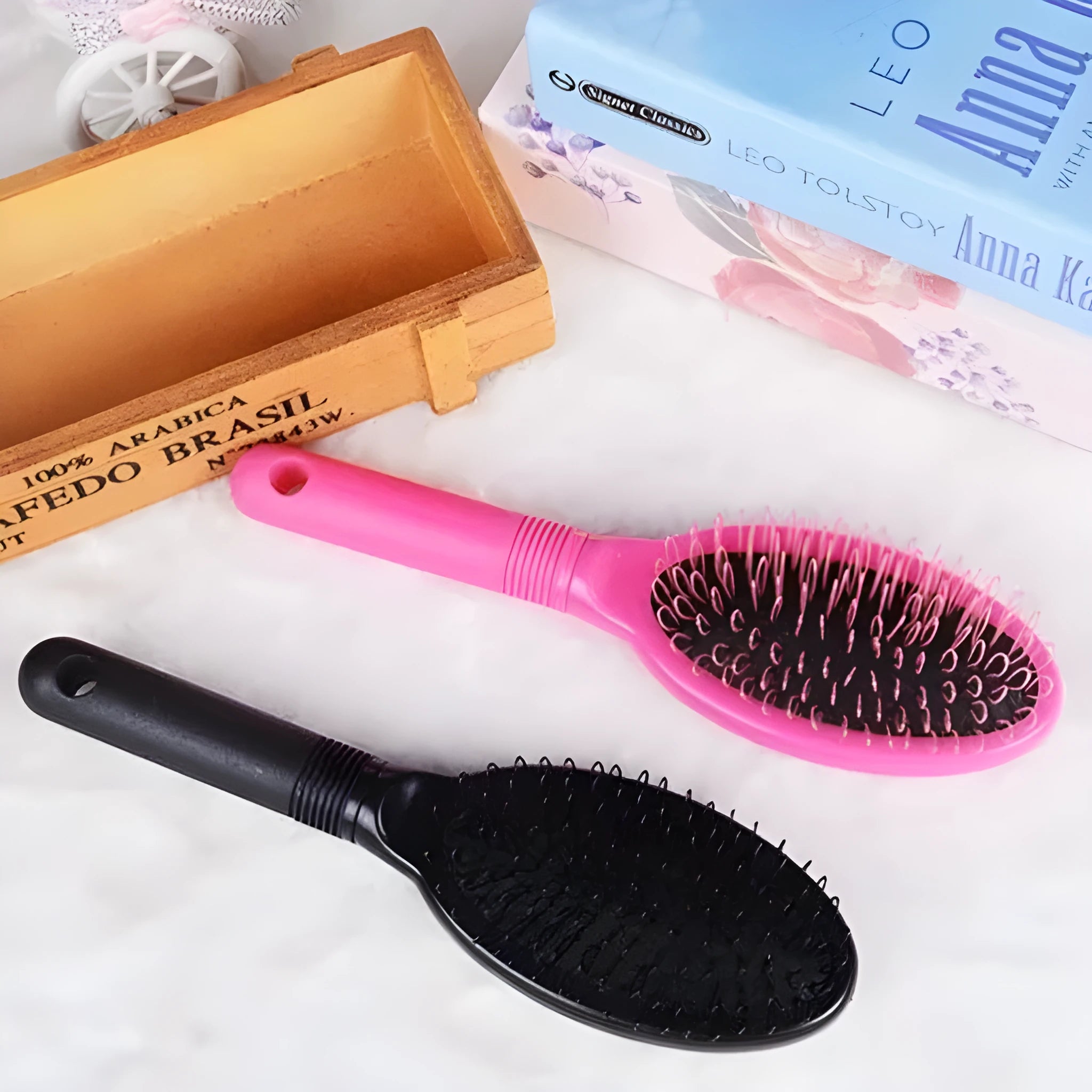 Black and pink ring tooth plastic comb for hair extensions, shown with measurements.