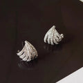 Geometric zircon earrings with platinum electroplated finish and European-American design style