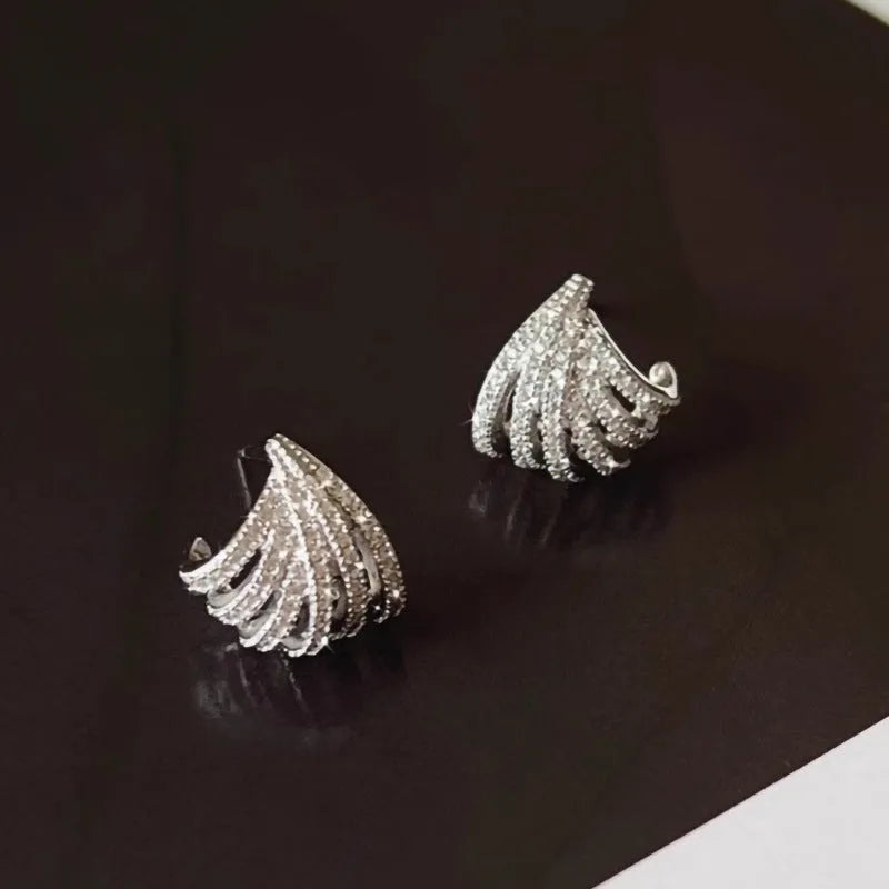 Geometric zircon earrings with platinum electroplated finish and European-American design style