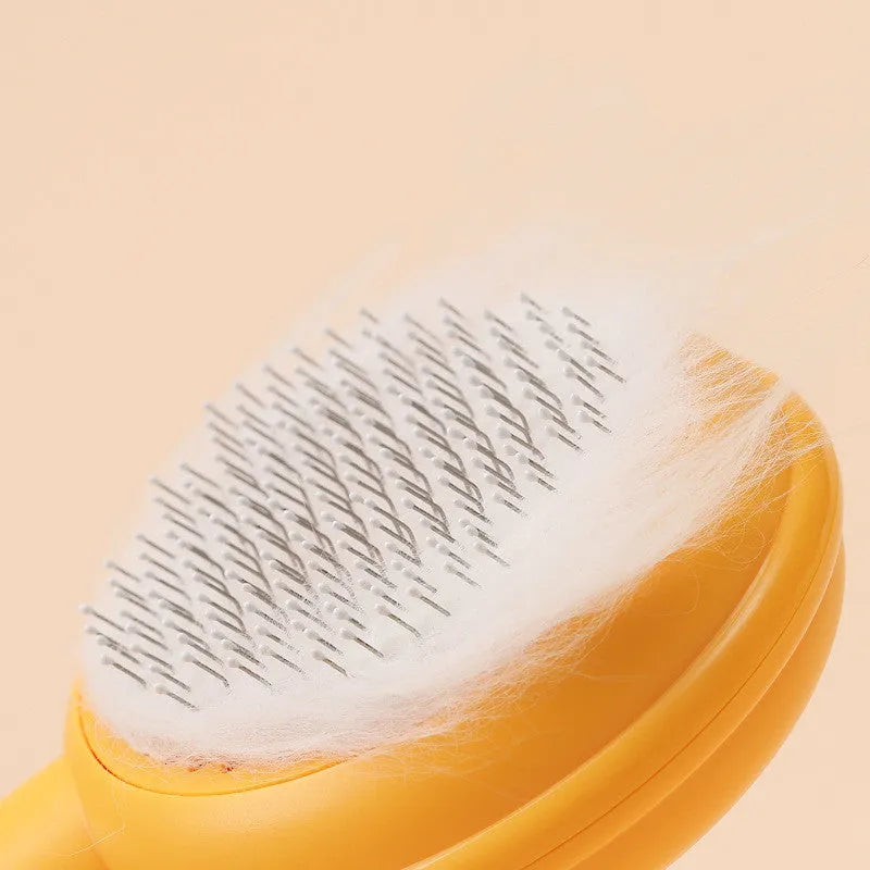 Pet hair cleaning comb brush with stainless steel needle head and ABS body, 198 x 87 x 46 mm, yellow green blue