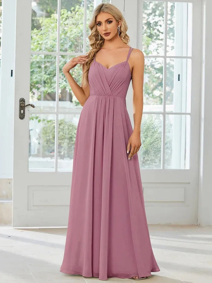 Women's sleeveless long A-line dress in polyester with pleated detailing, shown in light green colour