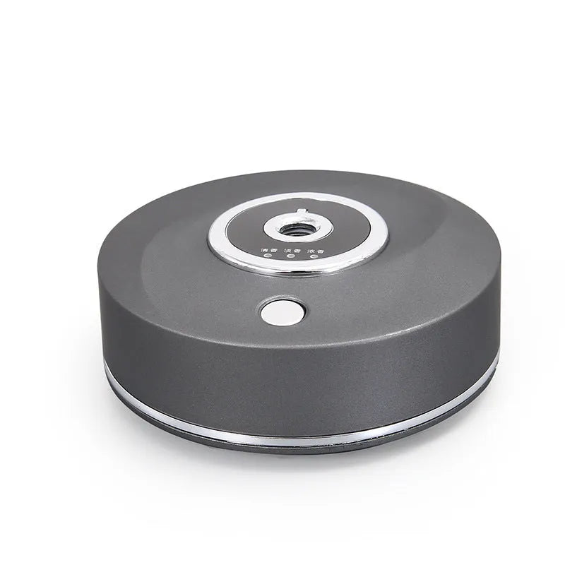USB-powered car air freshener diffuser with plastic housing in choice of black, grey, or white colours