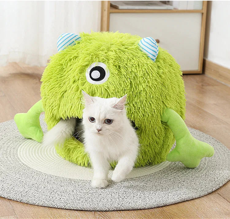 A round, fluffy plush cat bed with a non-slip base, shown in three size options for small, medium, and large pets.