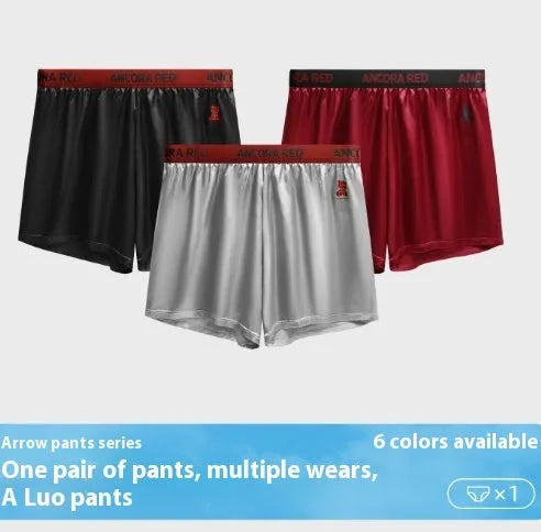 Men's solid colour polyester boxer briefs in black, shown with mid waist design.