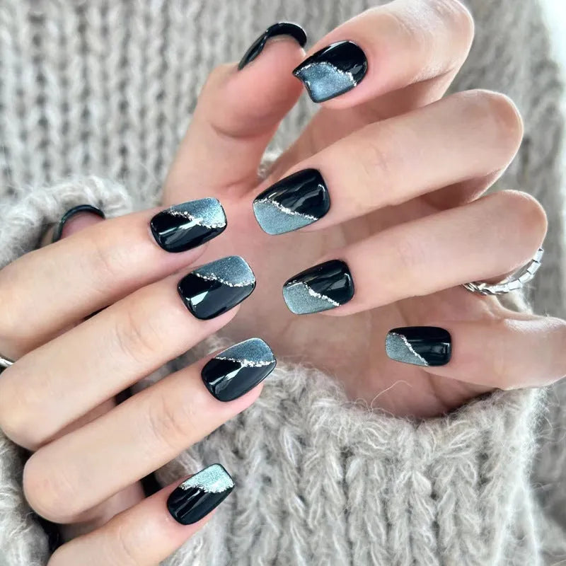 Pack of sweet girl style fake nails showing random colour designs in a set of ten.
