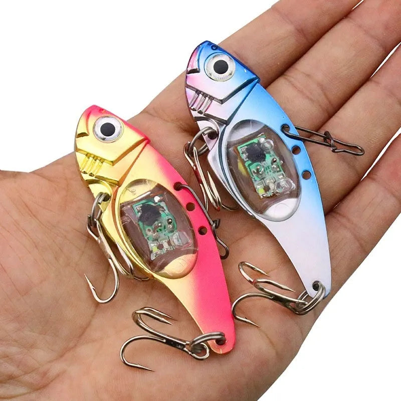 Luminous metal vib electronic fishing lure showing blue body and red body colour options