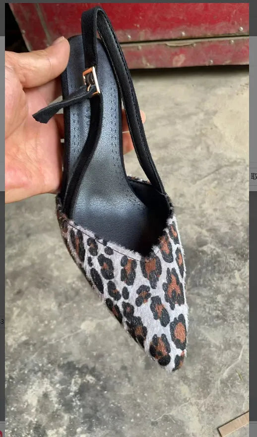 Leopard print suede women's sandals with pointed toe on a white background