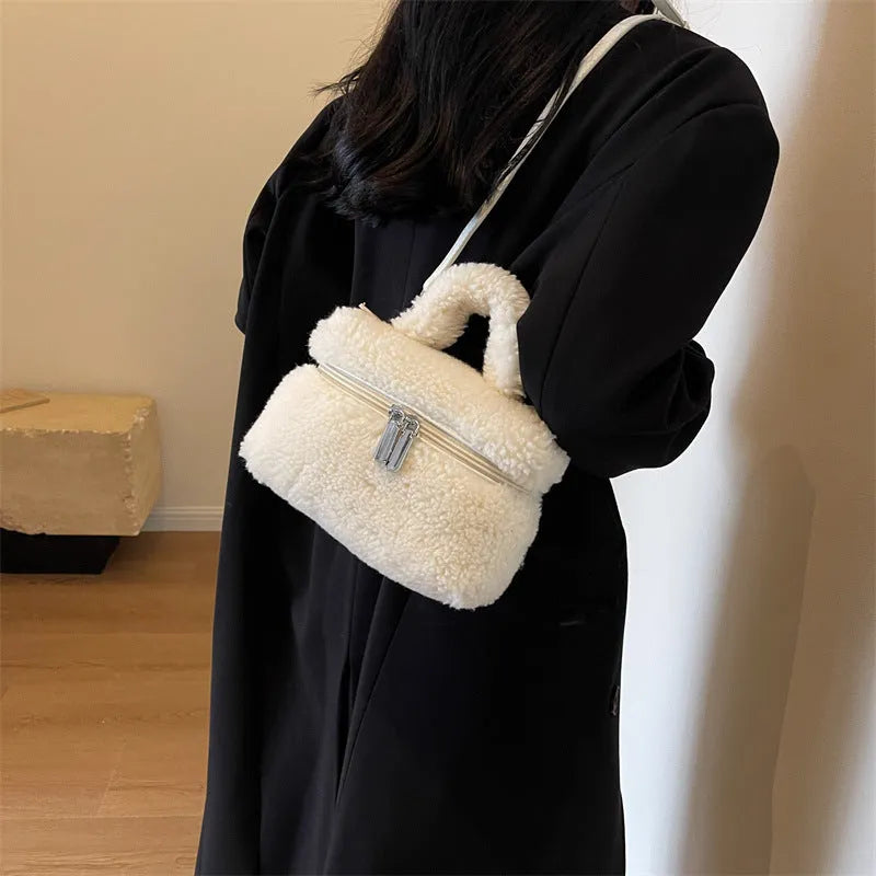 Soft plush women's shoulder bag in cream white, box shape with visible stitching and zipper pocket, street-trend style