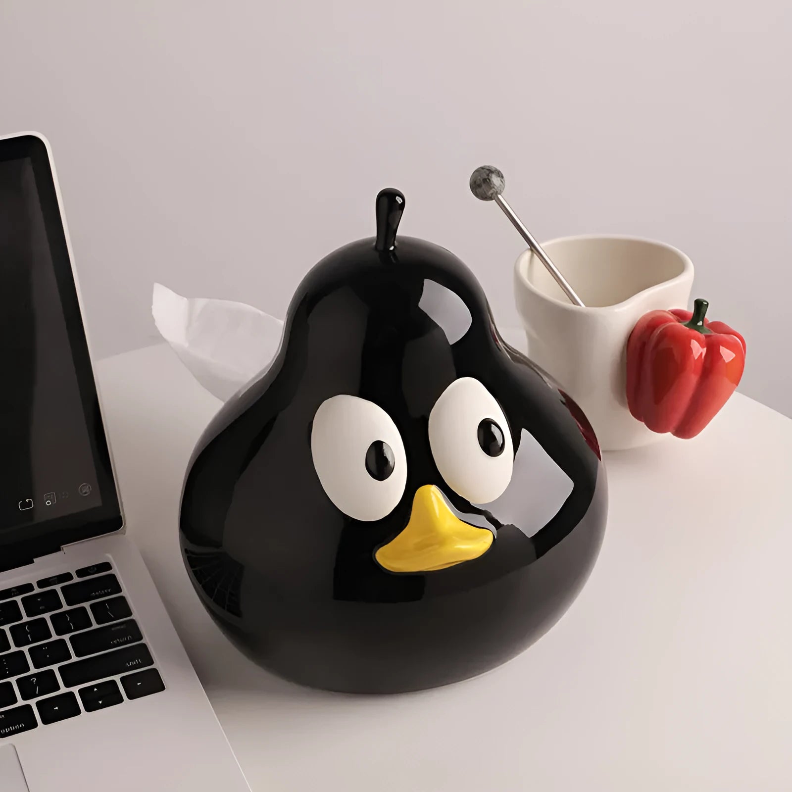 White ceramic pear-shaped tissue box holder with cute animal design in black or green colour