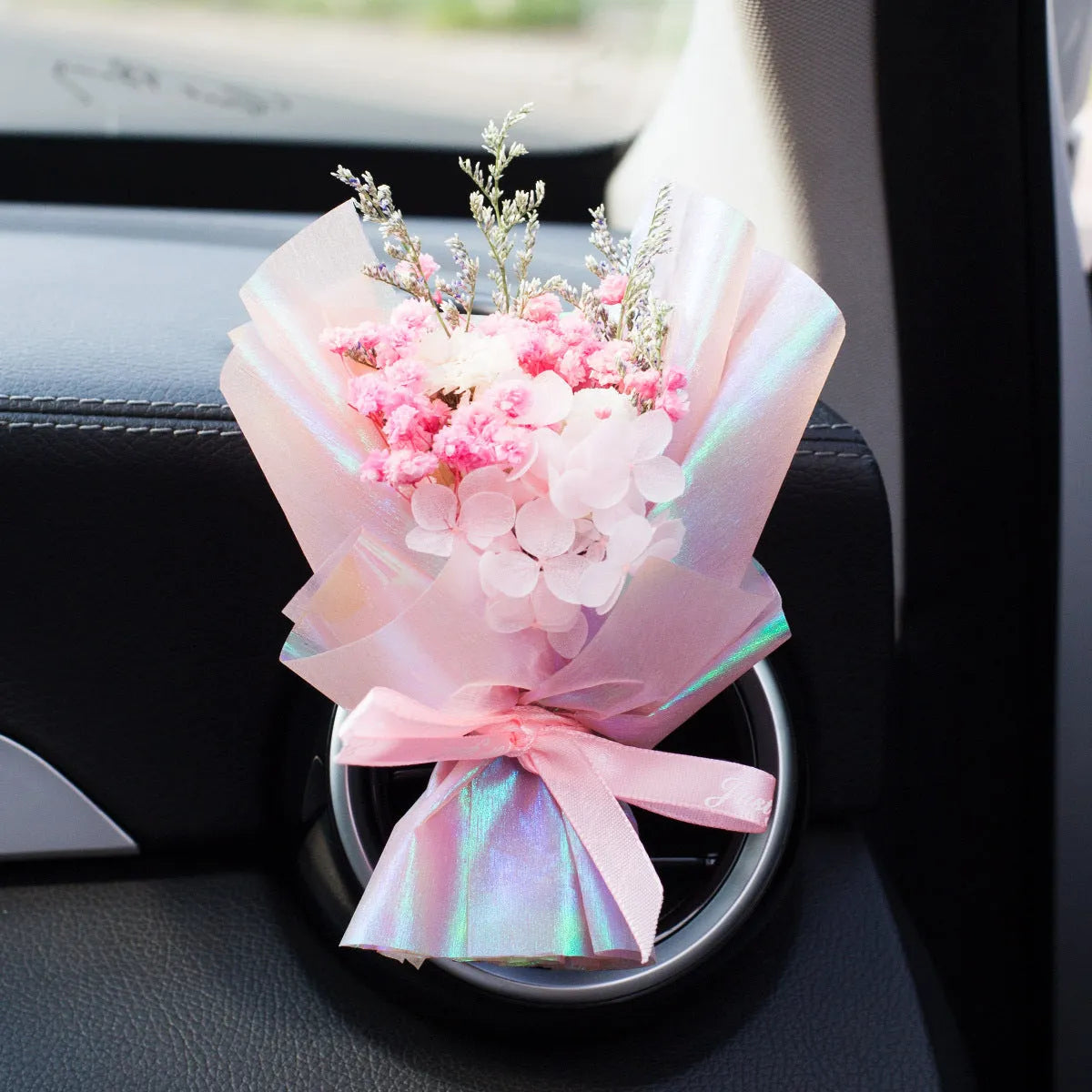 Handmade dried flower car air freshener ornament in multiple colours mounted on car vent