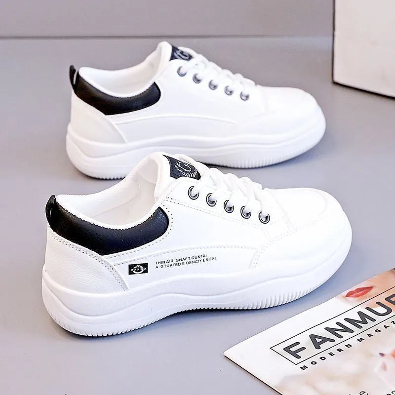 Women's white Korean-style leather pumps with cross straps and round toe, showing lace-up front and 3-5cm heel