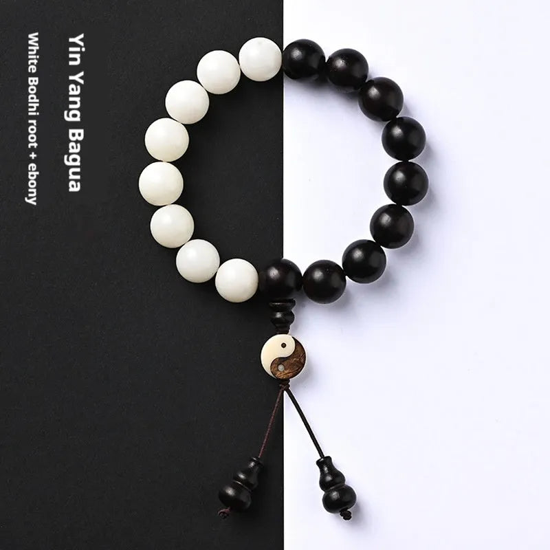 White Corypha Umbraculifera Blackwood and Bodhi seed bracelet with eight-diagram yuan beads.