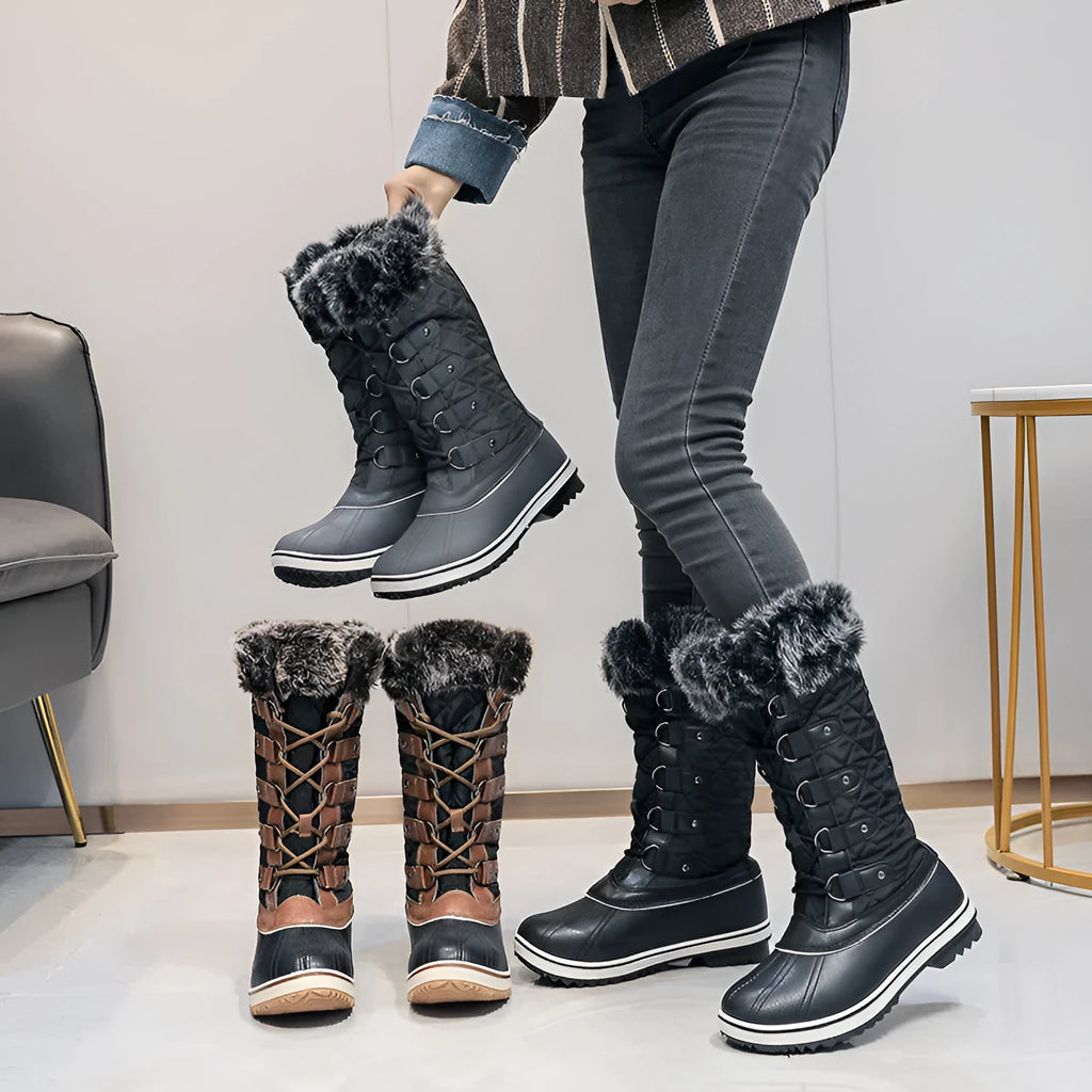 Women's high-top flat snow boots in black synthetic leather with round toe and high-top shaft
