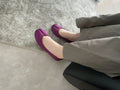 Women's slip-on flat bottom split toe pumps in red with low heel and rubber sole