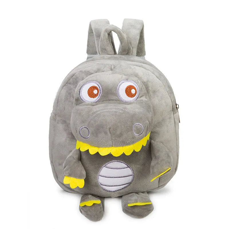 Soft blue dinosaur plush backpack with embroidered details and a soft handle.