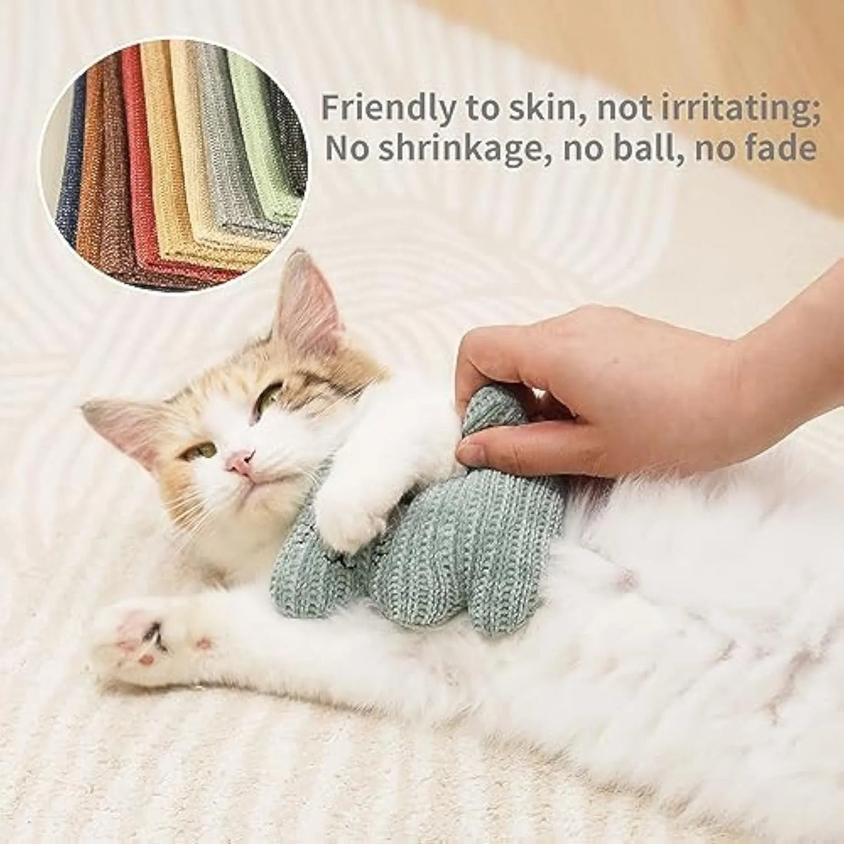 Cyan catnip plush rope toy with bell for cats on wooden floor