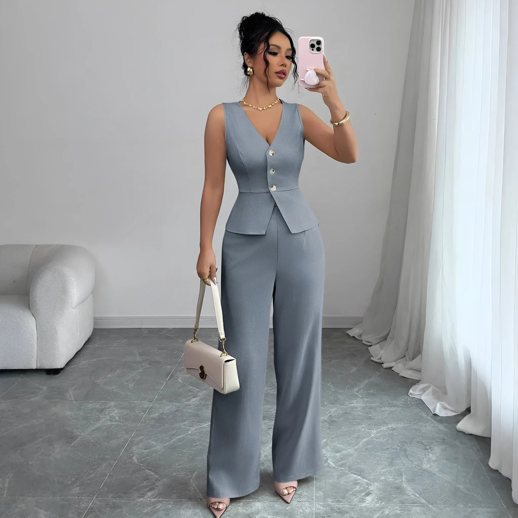 Women's sleeveless vest and high-waist trousers two-piece set in solid colour polyester fabric