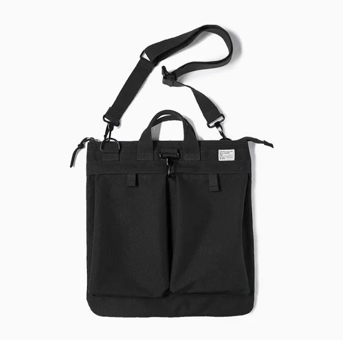 Military green canvas messenger bag with shoulder strap and zip closure showing internal phone pocket