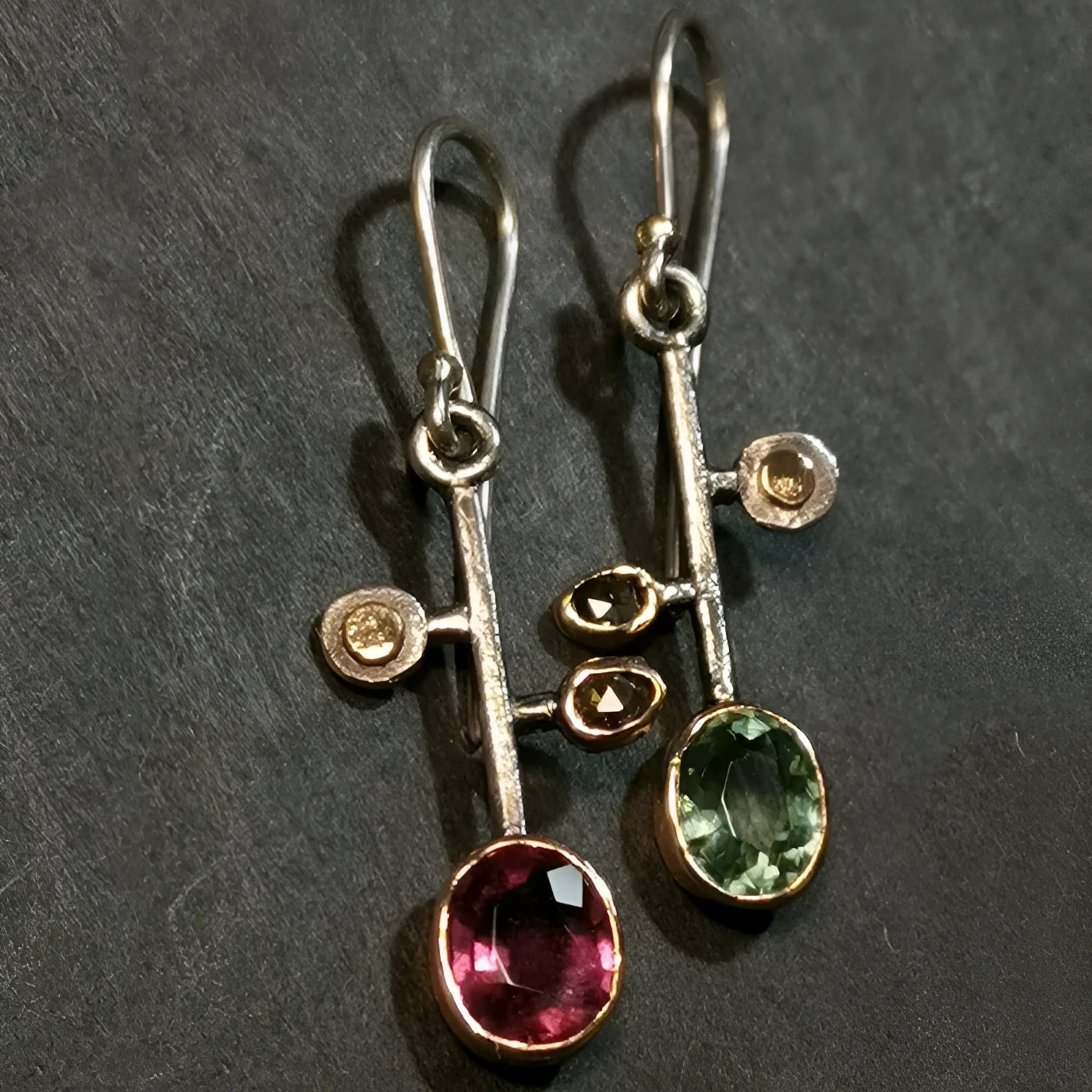 Crystal zircon retro asymmetric earrings in antique silver alloy on earring stand