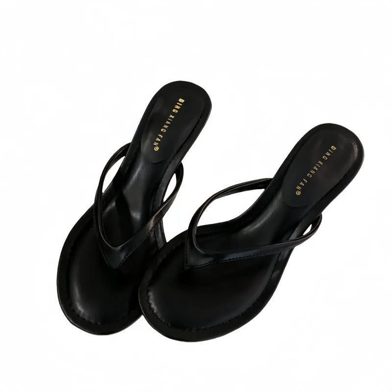 Women's simple round toe stiletto sandals in rubber, shown in classic black and sheepskin camel colours.