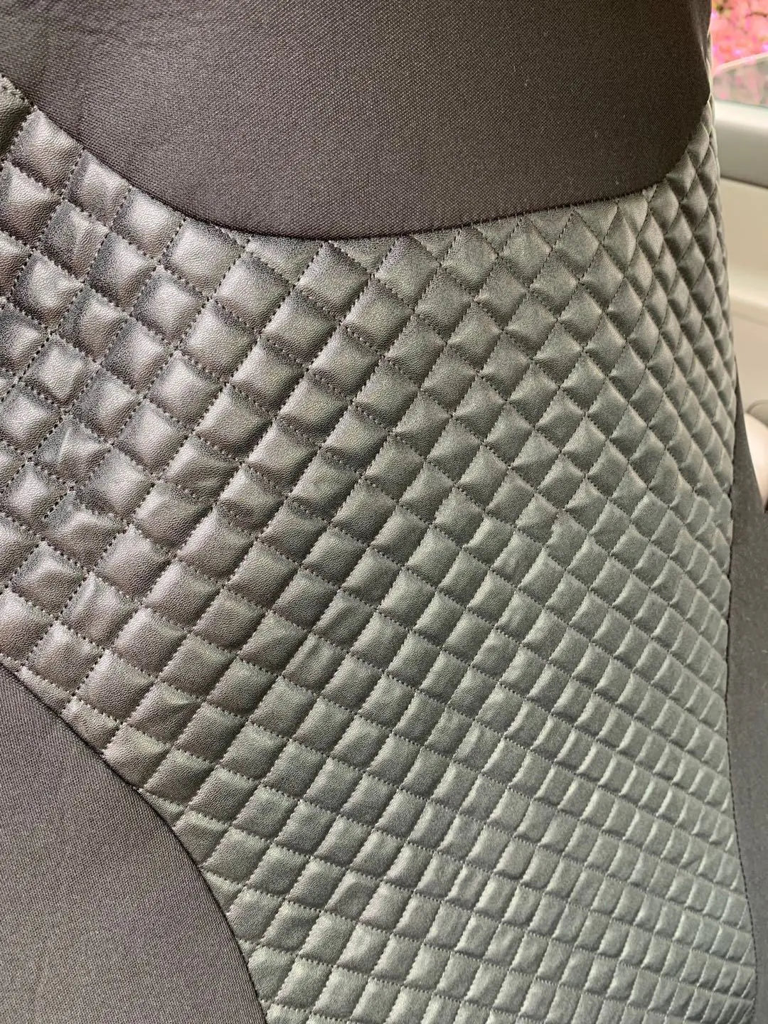 Black quilted polyurethane car seat cover for front seats with plastic attachment hooks