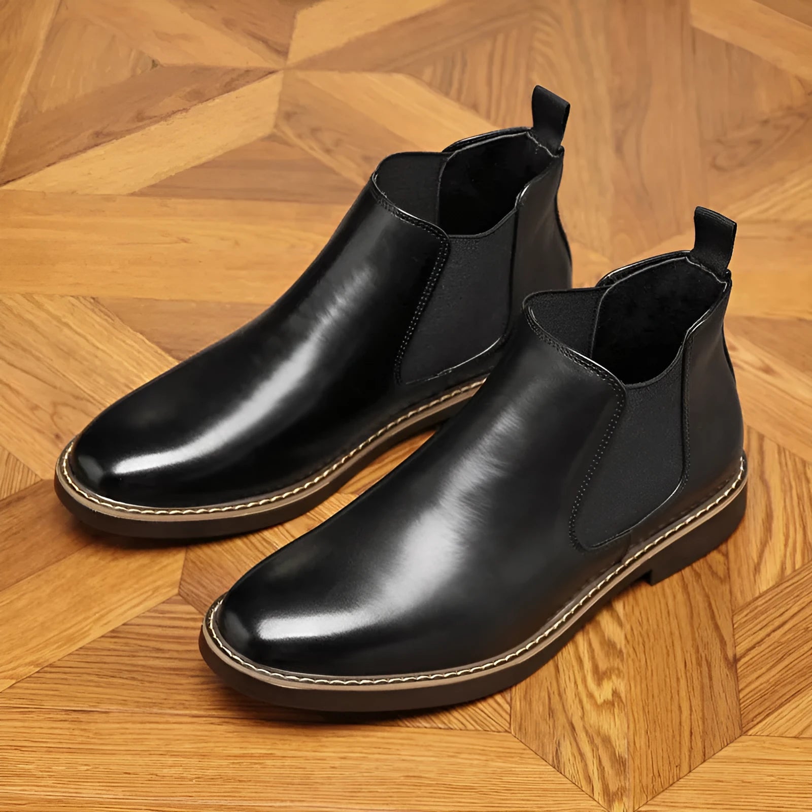 Men's black formal leather ankle boots with a pointed toe and square rubber sole.